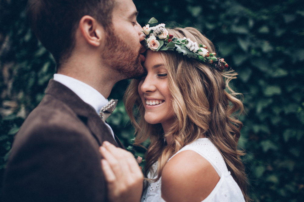 Happy wedding couple with glowing skin after bridal skin preparation